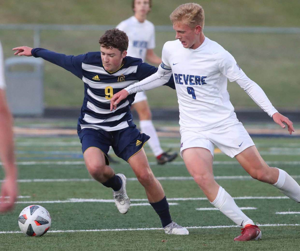 Robbie Rochford, left, of Copley and Jaden Yankovitz, of Revere, compete for the ball during the first half of a game at Copley High School on Tuesday, Sept. 27, 2022.