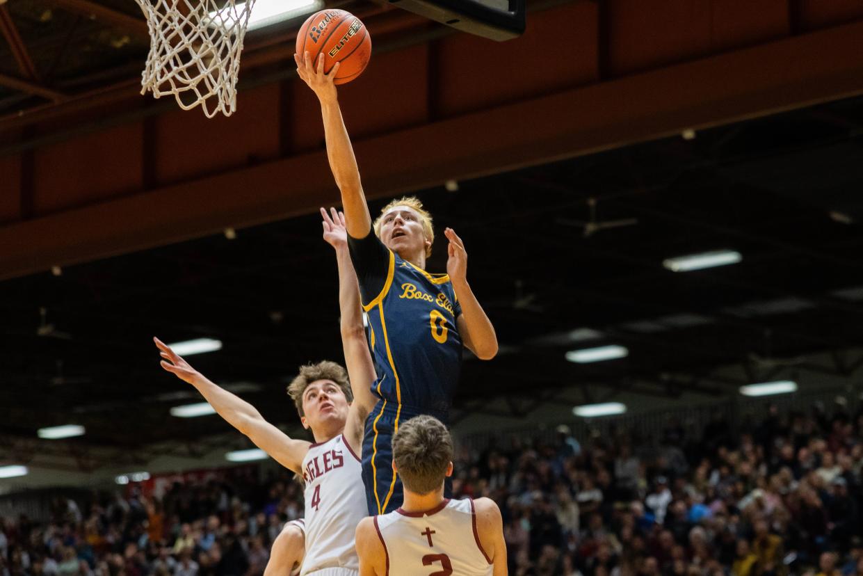 Box Elder's Tracen Jilot skies for a layup attempt against Manhattan Christian in the Class C boys' basketball championship game Saturday at Four Seasons Arena.