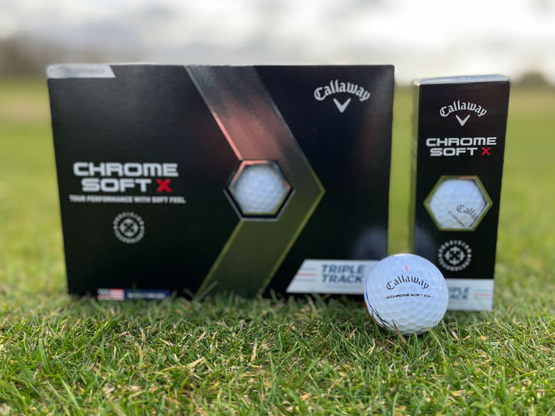 A box of Callaway Chrome Soft X Golf Ball outside of its case