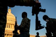 <p>Weapons are distributed to members of the National Guard outside the U.S. Capitol on January 13, 2021 in Washington, DC.</p>