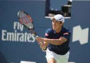 Jul 30, 2016; Toronto, Ontario, Canada; Kei Nishikori of Japan returns a ball during the semi final match against Stan Wawrinka of Switzerland (not pictured) during the Rogers Cup tennis tournament at Aviva Centre. Kei Nishikori of Japan won 7-6, 6-1. Mandatory Credit: Nick Turchiaro-USA TODAY Sports