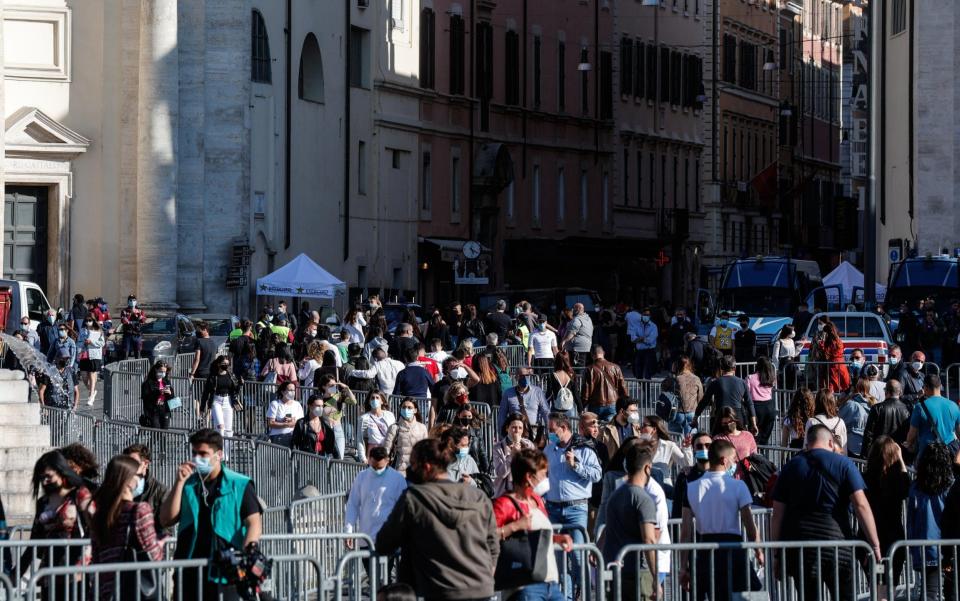 People enjoy a sunny day during the last weekend in the orange zone, in Rome - Giuseppe Lami/EPA-EFE/Shutterstock