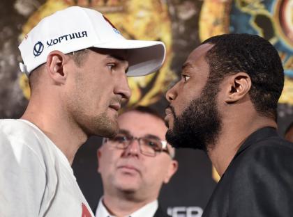 Champion Sergey Kovalev, left, and challenger Jean Pascal pose for the media. (AP)