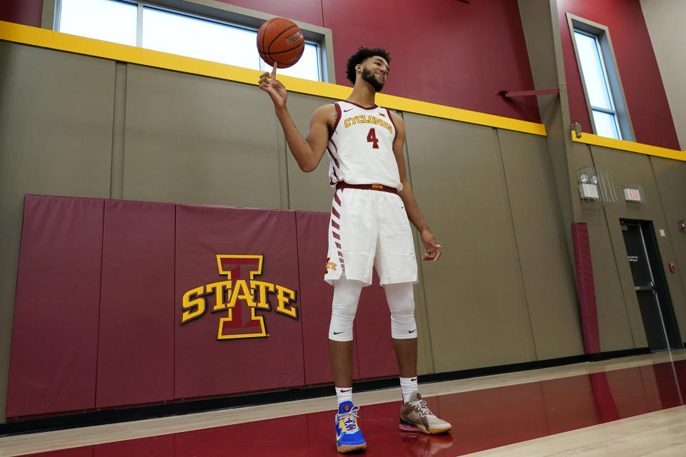 Iowa State forward George Conditt IV poses for photographers during Iowa State's NCAA college basketball media day, Wednesday, Oct. 13, 2021, in Ames, Iowa. (AP Photo/Charlie Neibergall)