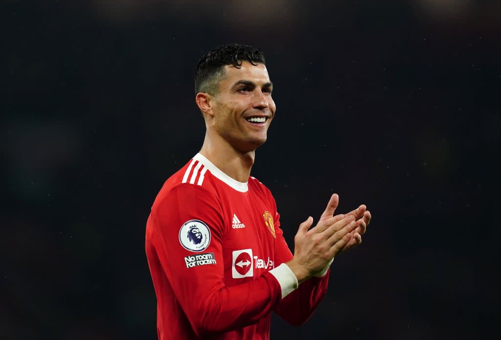 Manchester United’s Cristiano Ronaldo applauds the fans at Old Trafford (Martin Rickett/PA) (PA Wire)