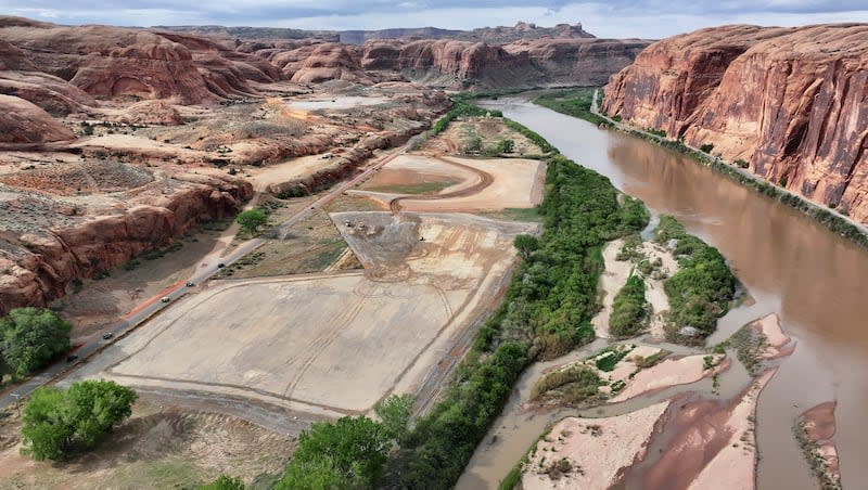 The 180-acre Kane Creek development site, which is in a floodplain, is pictured along the Colorado River near Moab on Friday, April 26, 2024. Developers plan to build around 580 residential and commercial units. There is only one road in and out.