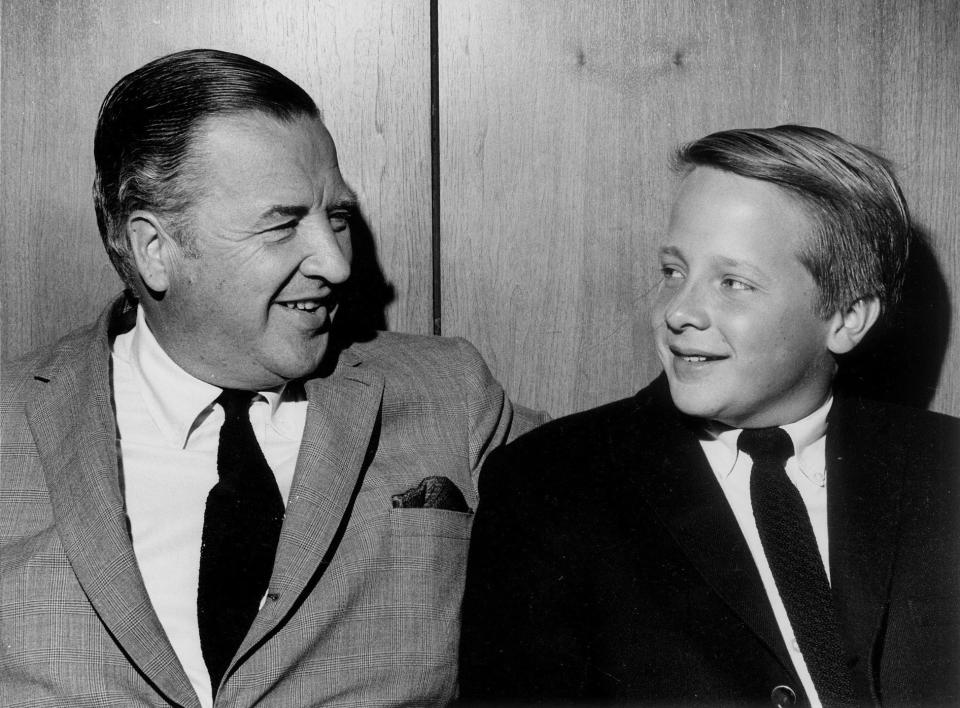 Henry Ford II is photographed with his son Edsel Ford on July 4, 1965.