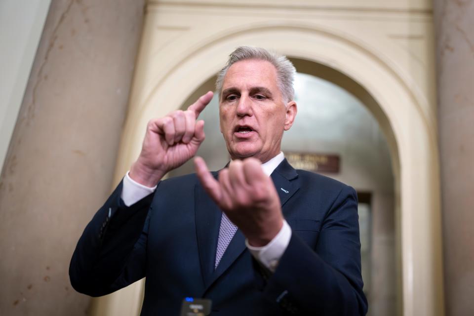 House Speaker Kevin McCarthy, R-Calif., talks to reporters as Congress returns to work in crisis mode days before a government shutdown, at the Capitol in Washington, Tuesday, Sept. 26, 2023. McCarthy faces an insurgency from hard-right Republicans eager to slash spending even if it means closing federal offices to millions of Americans. (AP Photo/J. Scott Applewhite)