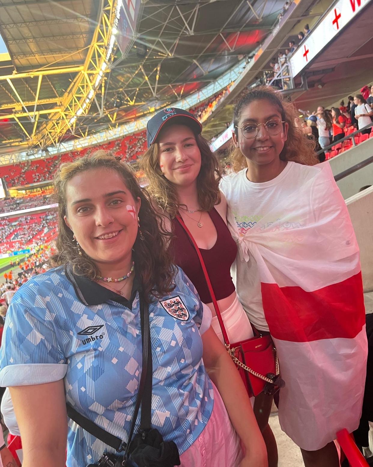 Woman standing with group of friends