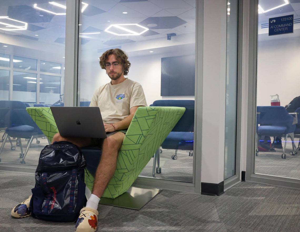 Pierson Mandell, sophomore at Miami Dade College, studies works in the artificial intelligence center after class at Miami Dade College’s North Campus, on March 6, 2023.