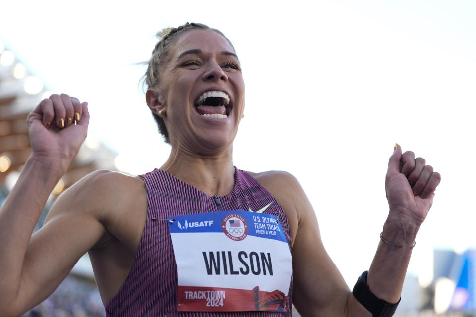 Second place finisher, Allie Wilson celebrates after the women's 800-meter final with during the U.S. Track and Field Olympic Team Trials Monday, June 24, 2024, in Eugene, Ore. (AP Photo/Charlie Neibergall)