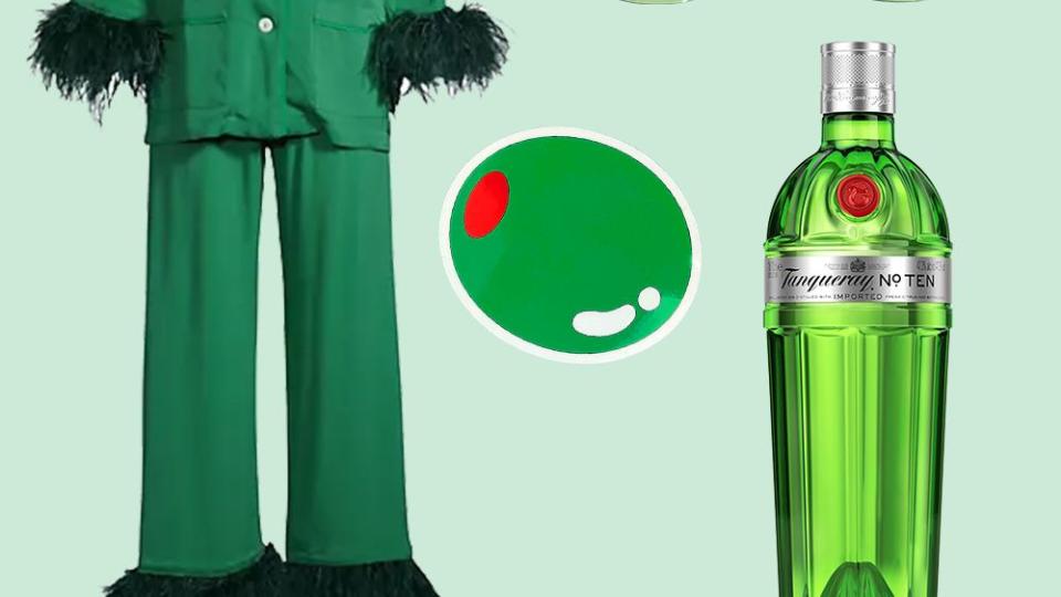 a green dress with a green coat and a bottle of alcohol