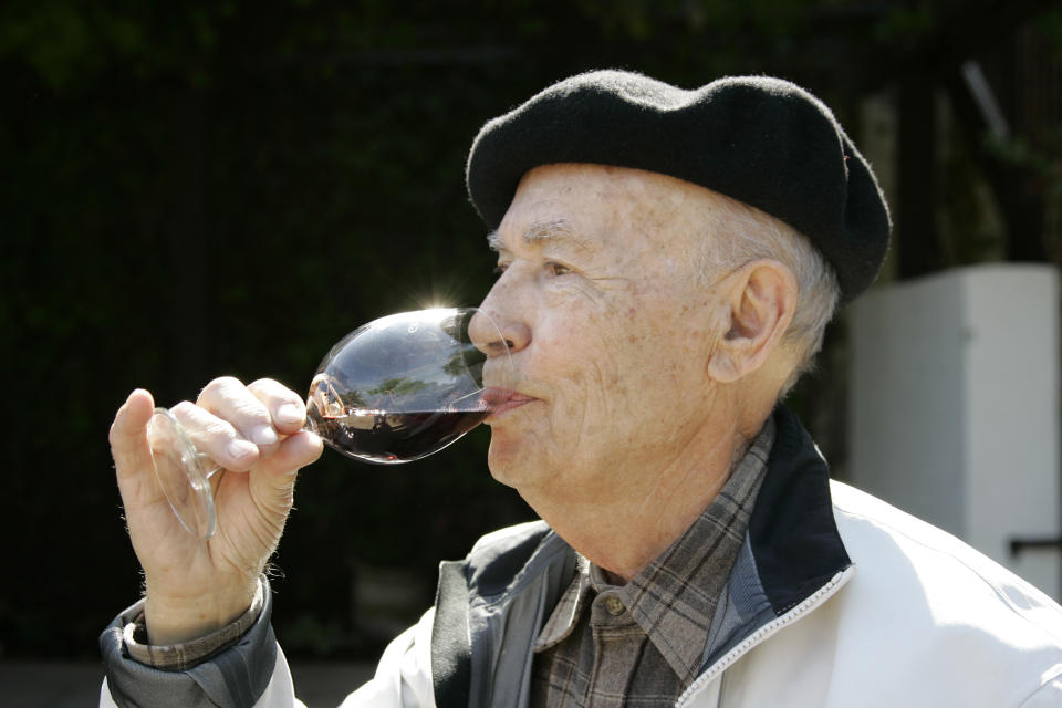 FILE - Winemaker Mike Grgich sips a glass of his Cabernet Sauvignon wine at the Grgich Hills Estate winery in Rutherford, Calif., on Sept. 15, 2008. Grgich, a celebrated winemaker who helped establish Napa Valley as one of the world’s premier wine-making regions, has died. He was 100. (AP Photo/Eric Risberg, File)