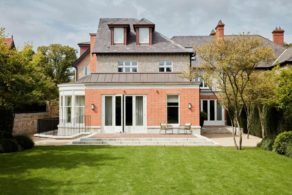 The south-facing kitchen and family rooms open out to the back garden.