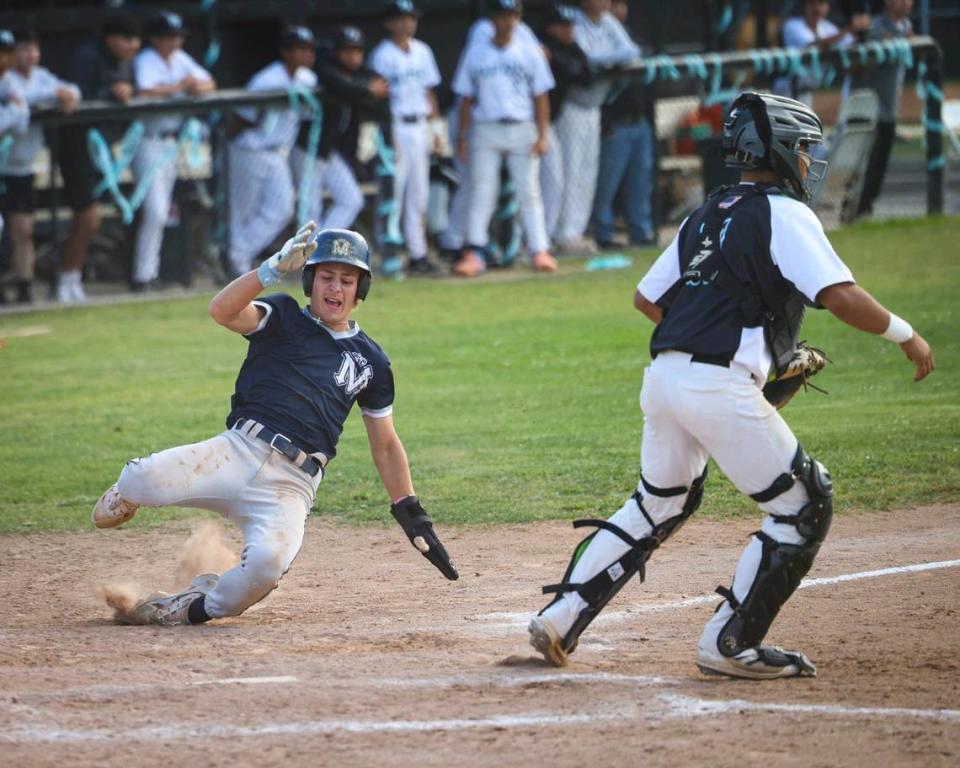 Thomas Glenn scores for the Royals around catcher Josue Garcia. Mission Prep lost a 6-5 decision to Pioneer Valley in a baseball game that went 11 innings May 10, 2024.