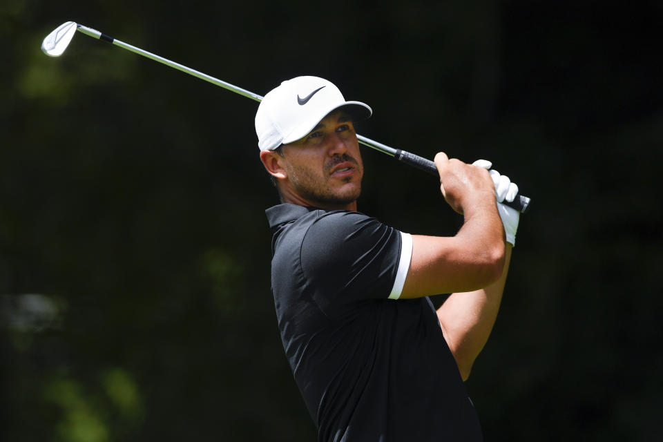 Brooks Koepka tees off to the second hole during the first round of the Tour Championship golf tournament Thursday, Aug. 22, 2019, in Atlanta. (AP Photo/John Amis)