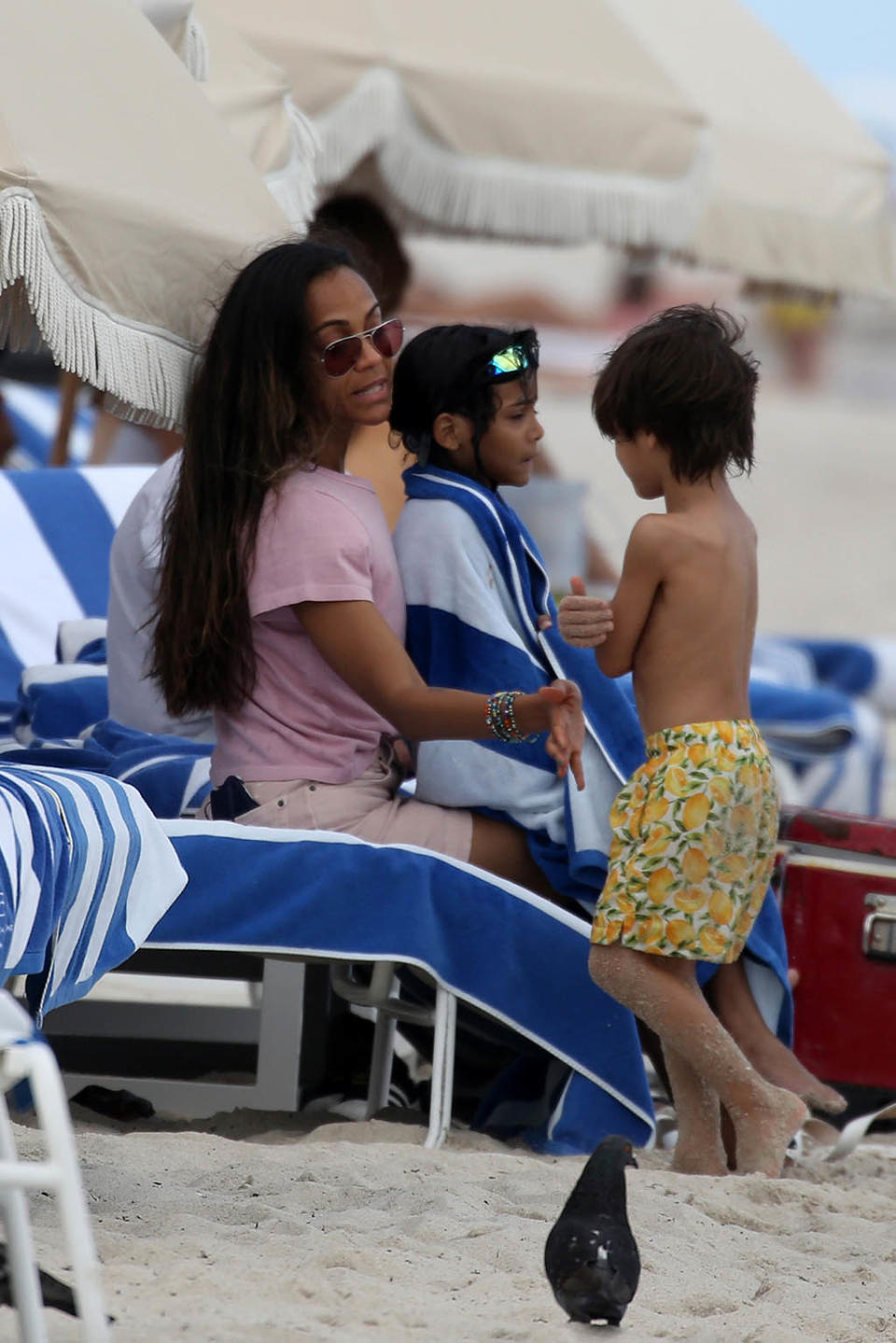 Zoe Saldana spends time with her kids at the beach in Miami, Florida on May 9, 2022. - Credit: MEGA