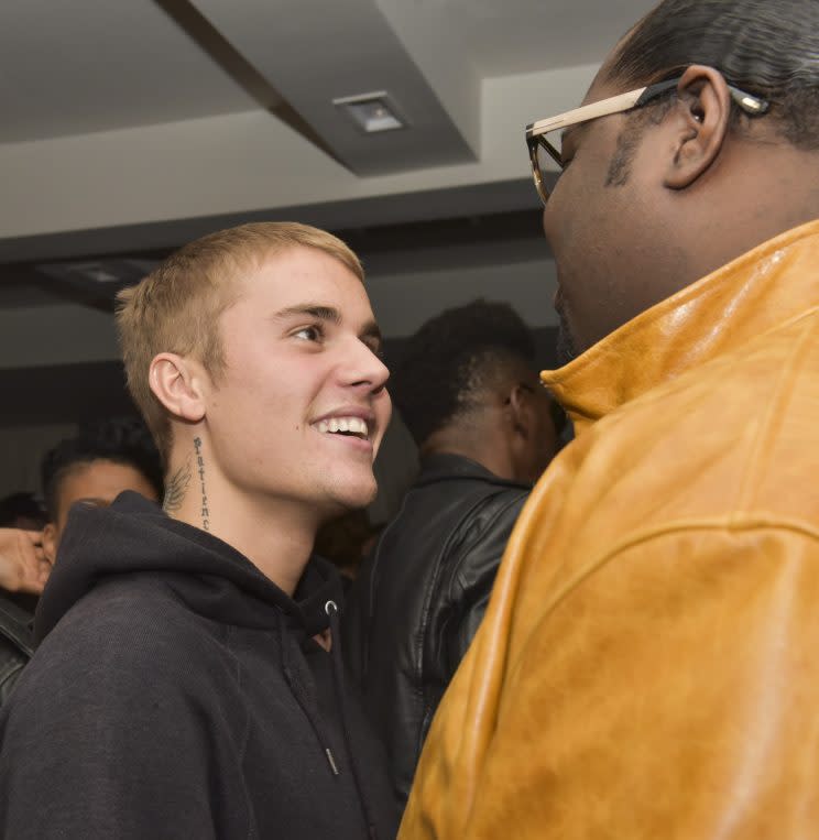 Bieber with his old pal Poo Bear at a pre-Grammy party on Feb. 10. (Photo: Getty Images)