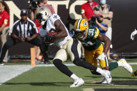 New Orleans Saints tight end Juwan Johnson, left, makes a touchdown reception in front of Green Bay Packers strong safety Adrian Amos (31) during the first half of an NFL football game, Sunday, Sept. 12, 2021, in Jacksonville, Fla. (AP Photo/Stephen B. Morton)