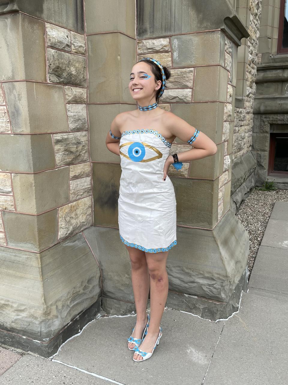 Erika Avellaneda poses in duct tape prom dress 2021 (Photo via Stuck At Prom Scholarship Contest)