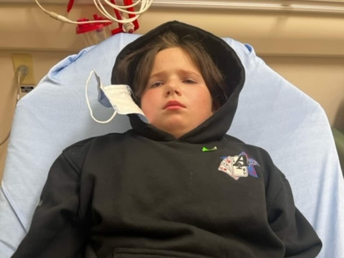 Nine-year-old Hailey Yaremie of Andrew, Alta., spent roughly nine hours waiting to be seen in the emergency room on Friday, Oct. 21. She spent another eight hours waiting in the ER the following Monday. (Submitted by Zolton Yaremie - image credit)