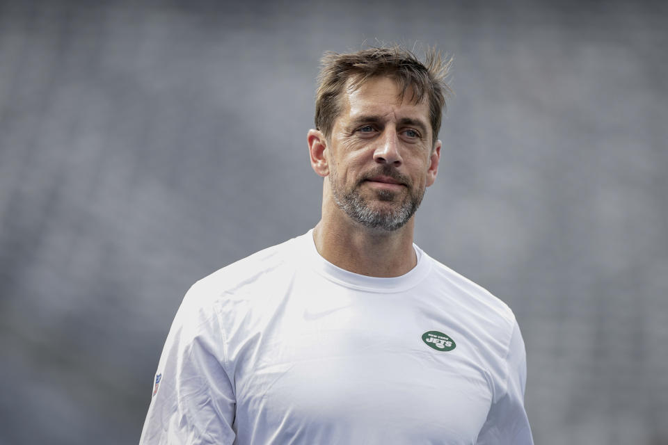 New York Jets quarterback Aaron Rodgers practices before an NFL preseason football game against the New York Giants, Saturday, Aug. 26, 2023, in East Rutherford, N.J. (AP Photo/Adam Hunger)