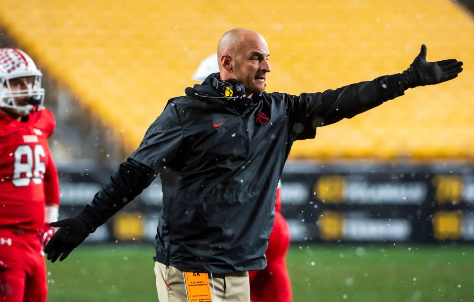 Moon head coach Ryan Linn takes issue with a call during the WPIAL 5A Championship Saturday at Heinz Field.[Lucy Schaly/For BCT]