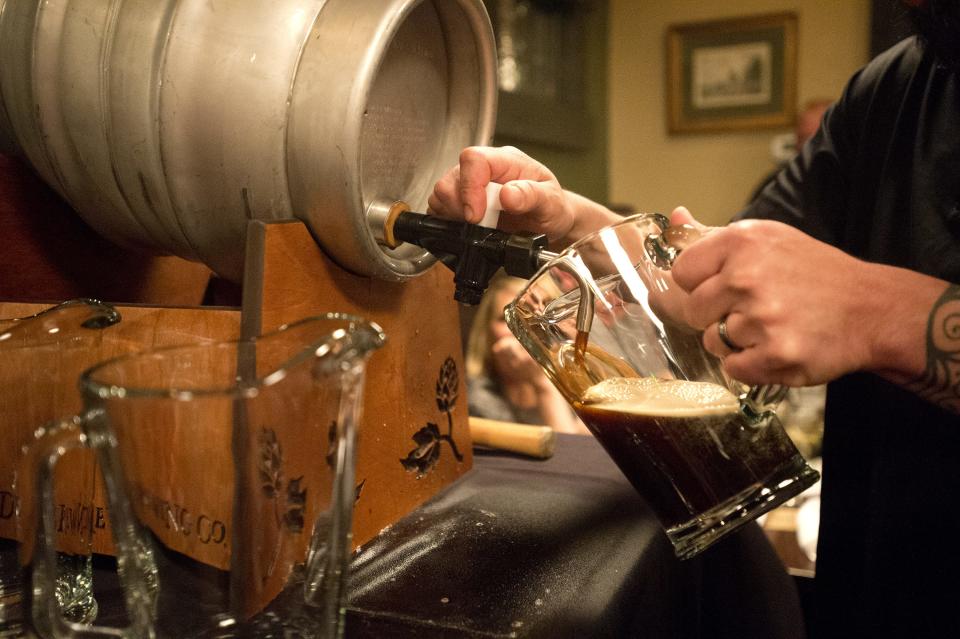 A specially-brewed salted caramel and Tahitian vanilla bean version of Cutthroat Porter is poured at The Moot House in Fort Collins Wednesday, April 23, 2014. Cutthroat Porter was launched in 1992 by Odell Brewing Co. and discontinued in 2018.