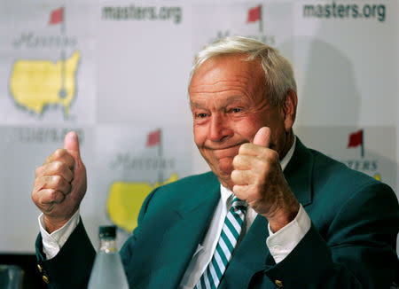 Golf legend and former Masters champion Arnold Palmer gestures after taking part in a news conference where it was announced that he would serve as honorary starter for the 2007 Masters golf tournament at the Augusta National Golf Club in Augusta, Georgia. REUTERS/Robert Galbraith