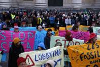 About 200 protesters gathered in the Paris streets demanding that France pays "not a single euro more for fossil energy"