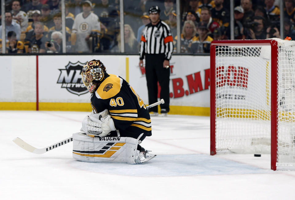 A shot by St. Louis Blues' Ryan O'Reilly settles in the net behind Boston Bruins goaltender Tuukka Rask, of Finland, for the first goal during the first period in Game 7 of the NHL hockey Stanley Cup Final, Wednesday, June 12, 2019, in Boston. (AP Photo/Michael Dwyer)