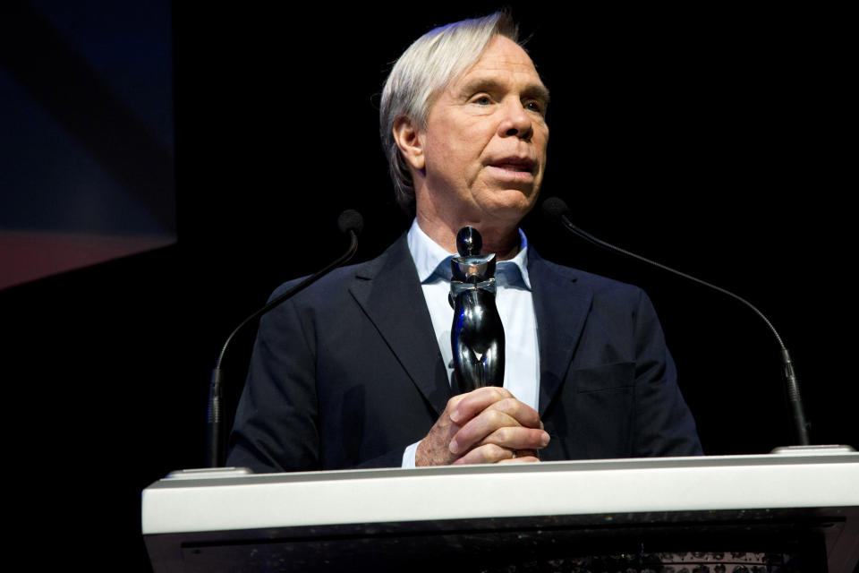 This June 4, 2012 photo shows fashion designer Tommy Hilfiger at a rehearsal for the CFDA Awards in New York. Hilfiger has been in the fashion business for more than 40 years, starting at a little denim shop in Elmira, N.Y., and now at the helm of a brand that's one of the most recognizable in the world. This spring, he added “American Idol” style adviser to his resume. His peers at the Council of Fashion Designers of America honored him Monday night with a lifetime achievement award. (AP Photo/Charles Sykes)