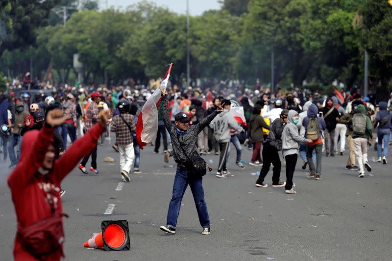 Protesters demand for a polarising new labour law to be repealed in Jakarta, Indonesia