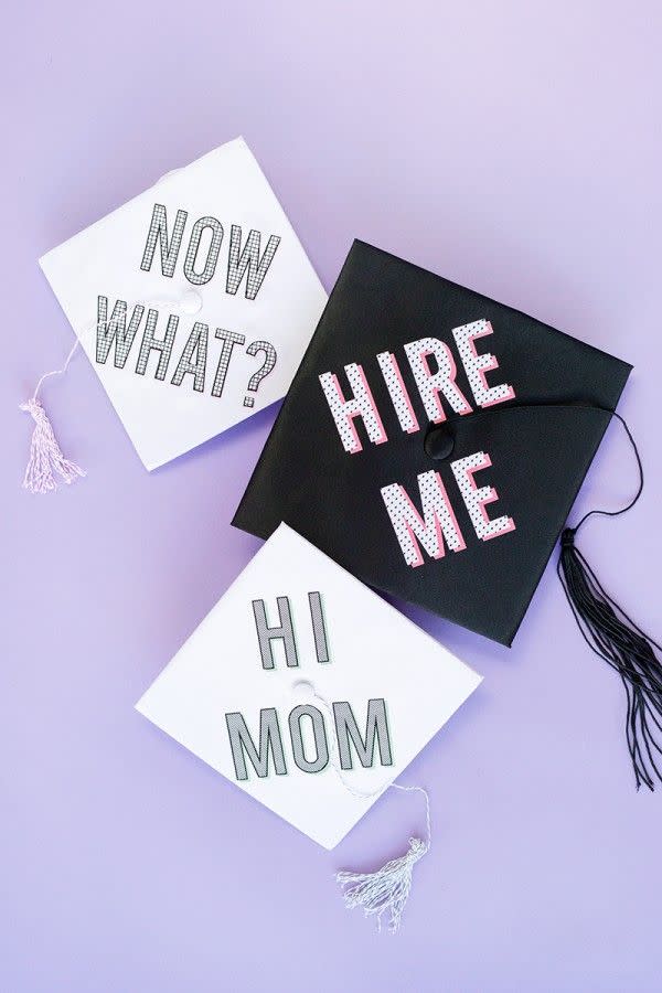 graduation caps with messages on top