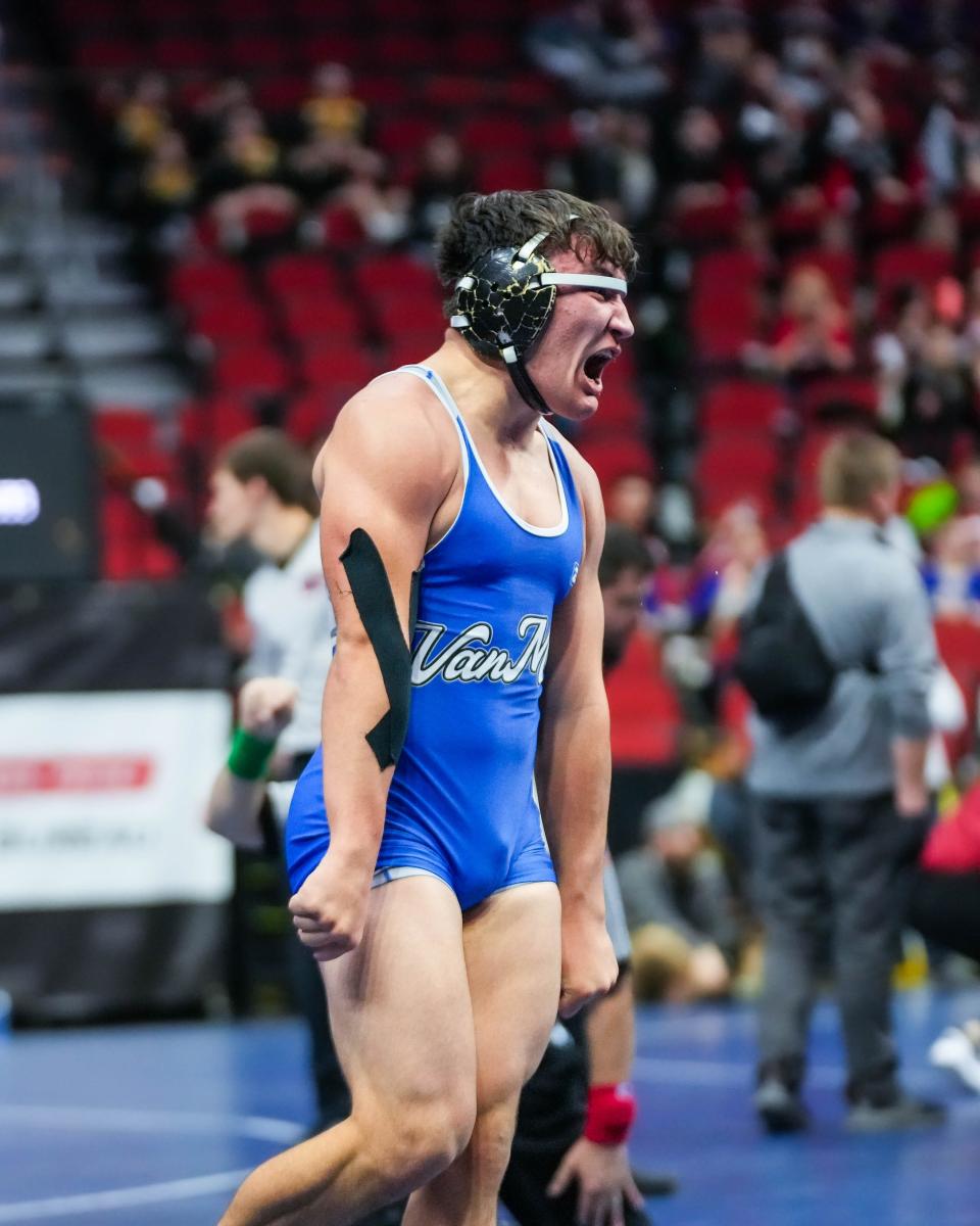 Van Meter’s Jackson Boese celebrates after defeating Clarinda’s Karson Downey in overtime at 182 pounds during the Class 2A quarterfinals of the Iowa high school state wrestling tournament at Wells Fargo Arena in Des Moines on Thursday, Feb. 16, 2023.