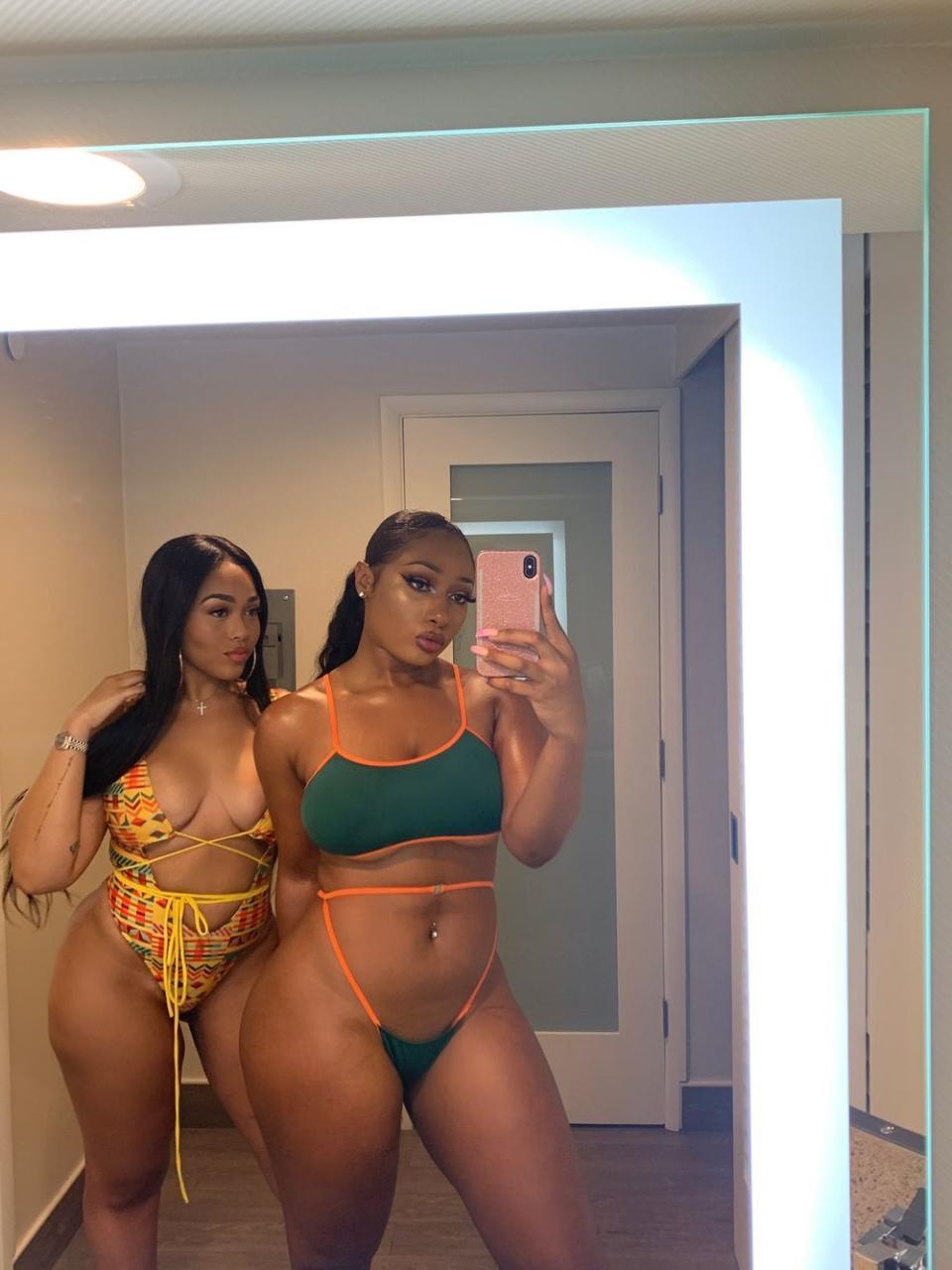 Jordyn Woods and Megan Thee Stallion pose in swimsuits
