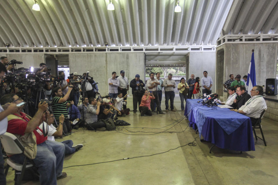 Members of the negotiation team speak to the press after long-stalled talks on resolving the country's political crisis restarted during a press conference in Managua, Nicaragua, Wednesday, Feb. 27, 2019. The talks come shortly after authorities released dozens of people arrested in last year's crackdown on anti-government protests. At the table are Apostolic Nuncio Waldemar Sommertag, government representative Chancellor Denis Moncada, Cardinal Leopoldo Brenes and Civic Alliance representative Mario Arana. (AP Photo/Alfredo Zuniga)