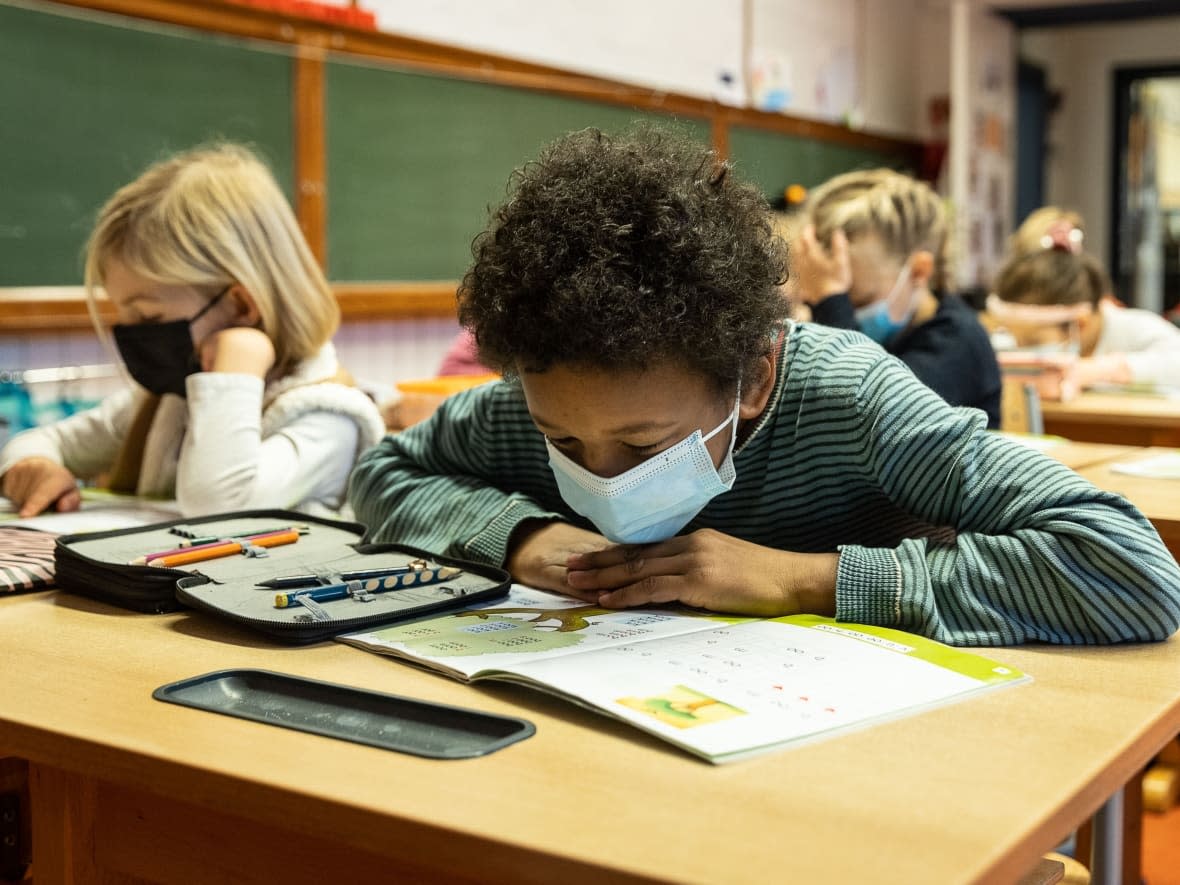 Ontario's Education Ministry said most health and safety requirements for the upcoming school year will remain unchanged from the end of the 2021-22 school year, including the voluntary use of masks.  (James Arthur Gekiere/Belga Mag/AFP/Getty Images - image credit)