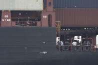 Officials gather on the decks of the MSC Gayane container ship on the Delaware River in Philadelphia, Tuesday, June 18, 2019. U.S. authorities have seized more than $1 billion worth of cocaine from a ship at a Philadelphia port, calling it one of the largest drug busts in American history. The U.S. attorney’s office in Philadelphia announced the massive bust on Twitter on Tuesday afternoon. Officials said agents seized about 16.5 tons (15 metric tons) of cocaine from a large ship at the Packer Marine Terminal. (AP Photo/Matt Rourke)