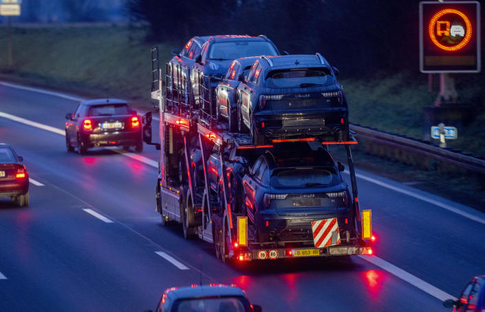A truck transports cars on a highway in Frankfurt, Germany, Friday, Jan. 27, 2023. A European ban on imports of diesel fuel and other products made from crude oil in Russian refineries takes effect Feb. 5. The goal is to stop feeding Russia's war chest, but it's not so simple. Diesel prices have already jumped since the war started on Feb. 24, and they could rise again. (AP Photo/Michael Probst)