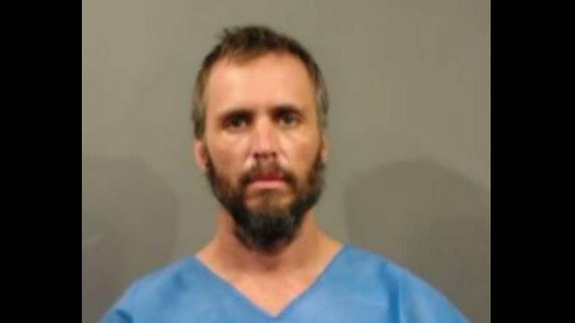 Travis B. Davis, 39, pleaded guilty to charges for shooting at Wichita police officers and vehicles during an Aug. 7, 2022, standoff.