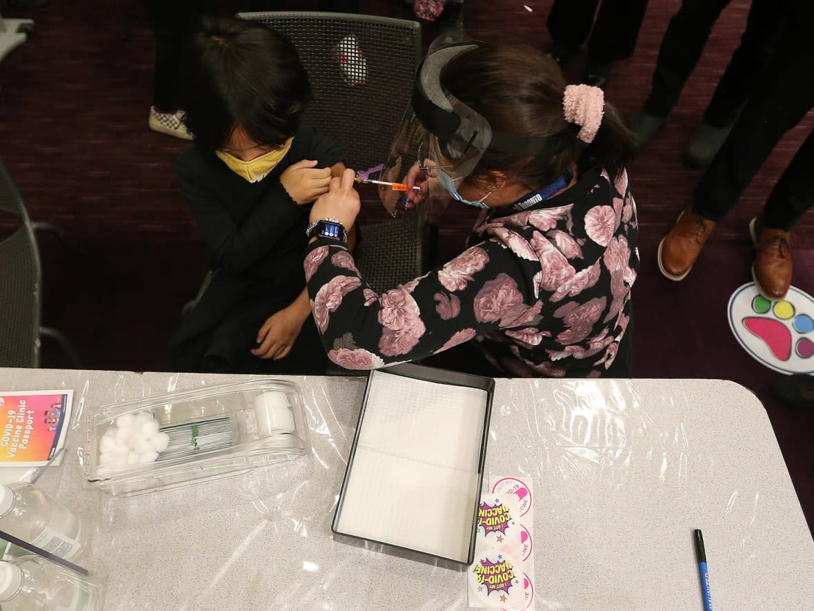 Kids between the ages of five and 11 who are patients at the Hospital for Sick Children were some of the first to get vaccinated against COVID-19 at the Metro Toronto Convention Centre earlier this week. (Steve Russell/The Canadian Press - image credit)
