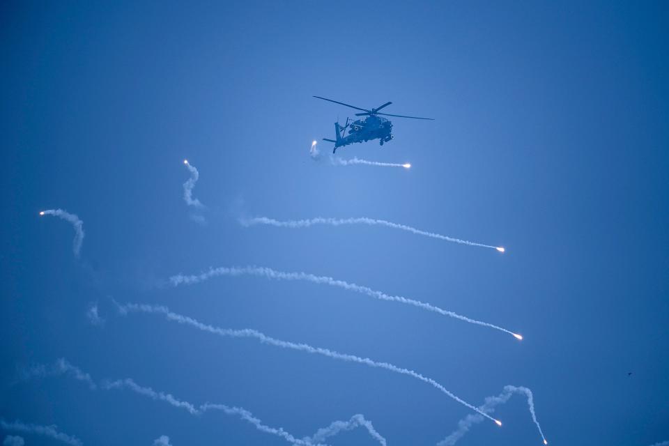 Indian Air Force (IAF) Mi35 Apache helicopter performs during the 88th Air Force Day parade at Hindon Air Force station in Ghaziabad on October 8, 2020. (Photo by Money SHARMA / AFP) (Photo by MONEY SHARMA/AFP via Getty Images)