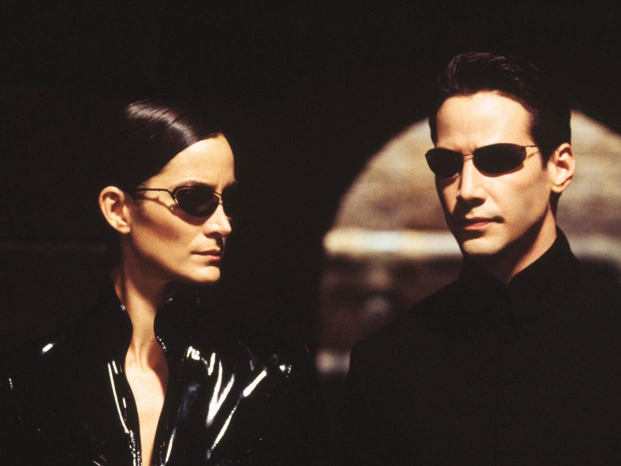 Carrie-Anne Moss and Keanu Reeves in 'The Matrix Reloaded': Rex Features