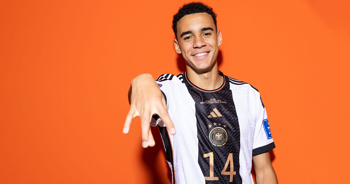  Jamal Musiala of Germany poses during the official FIFA World Cup Qatar 2022 portrait session on November 17, 2022 in Doha, Qatar.  