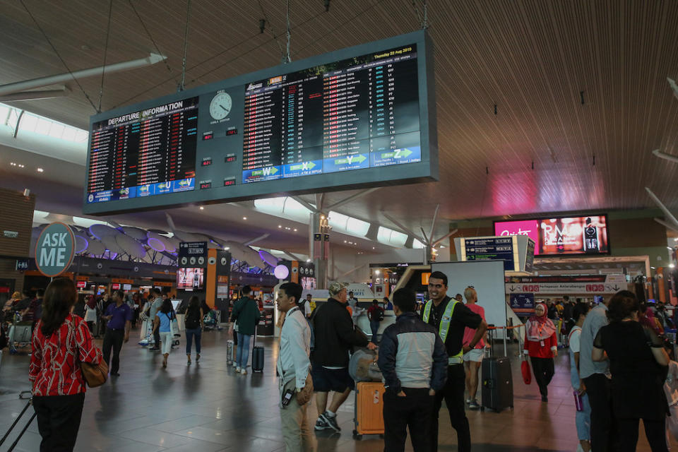 Passengers are seen at KLIA2 in Sepang August 22, 2019, during a systems outage. — Picture by Yusof Mat Isa