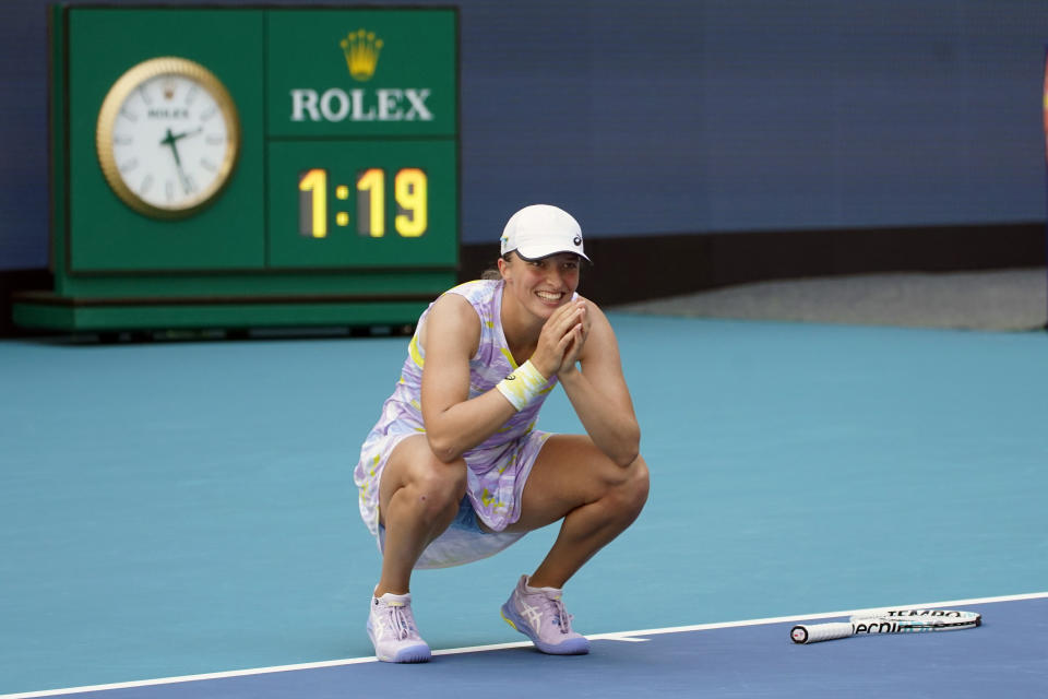 Iga Swiatek of Poland, reacts after beating Naomi Osaka of Japan, 6-4, 6-0, during the women's singles finals of the Miami Open tennis tournament, Saturday, April 2, 2022, in Miami Gardens, Fla. (AP Photo/Wilfredo Lee)