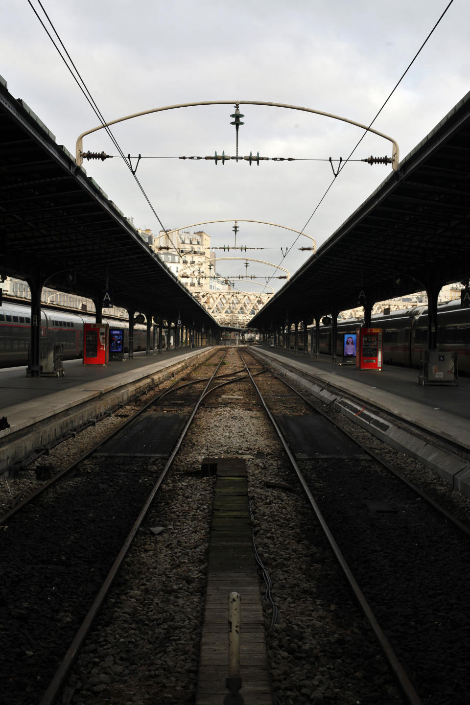 An empty railway platform at the Gare de l'Est railway station, in Paris, Thursday, Dec. 26, 2019. France's punishing transportation troubles may ease up slightly over Christmas, but unions plan renewed strikes and protests in January to resist government plans to raise the retirement age to 64. (AP Photo/Thibault Camus)