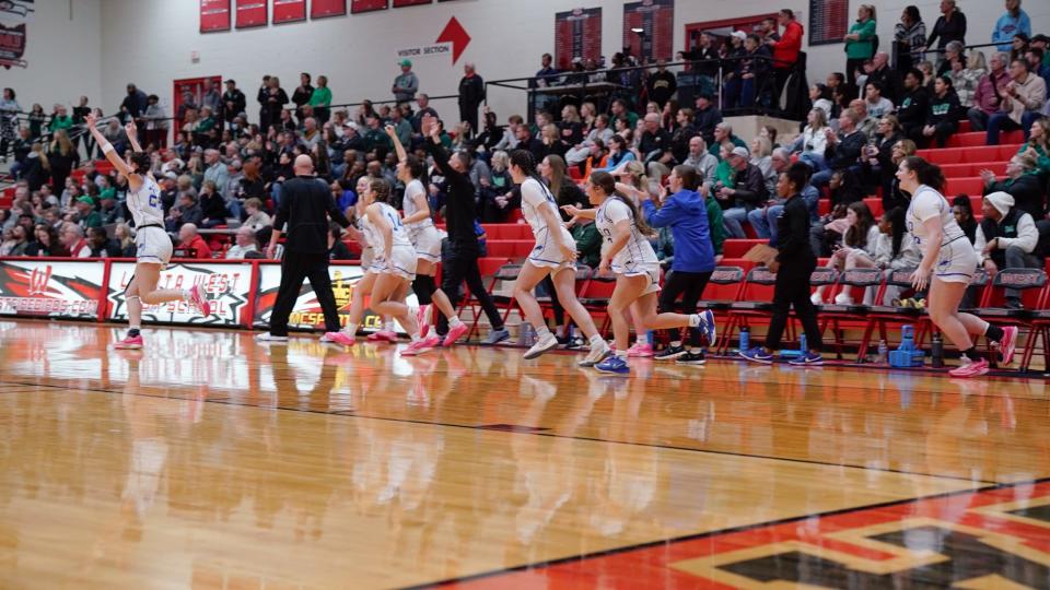 The Springboro Panthers celebrate after defeating the Mason Comets in a Division I regional semifinal on March 6, 2024 at Lakota West High School in West Chester, Oh.