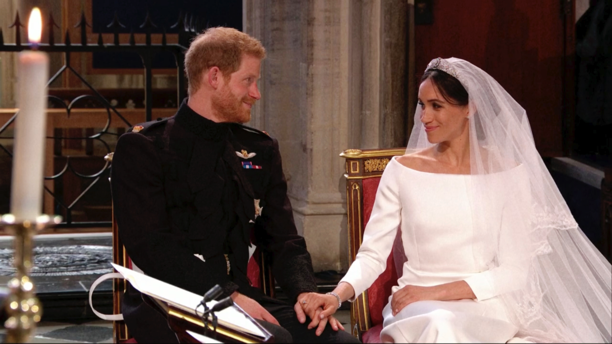 Meghan Markle calms a nervous Prince Harry as the pair sit and listen to the service. (Photo: AP)